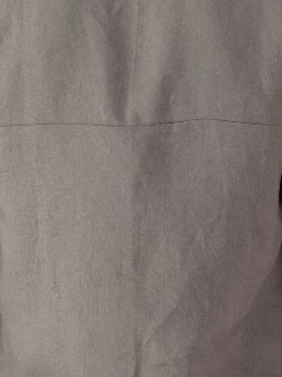 Grey fabric swatch: "Grey deadstock linen fabric swatch — Hawkdun top colourway, Lohi Linen Central Otago"