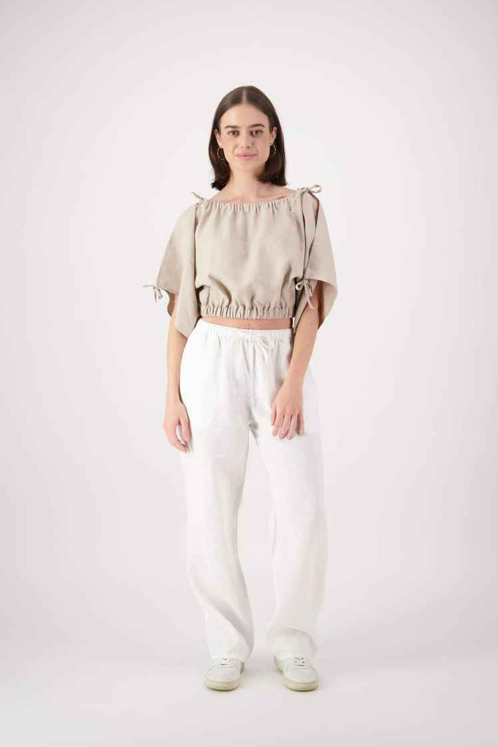 Main shot: "Naseby linen top in tan, relaxed cropped puff sleeve with gathered waist, handmade by Lohi Linen in Central Otago, New Zealand"