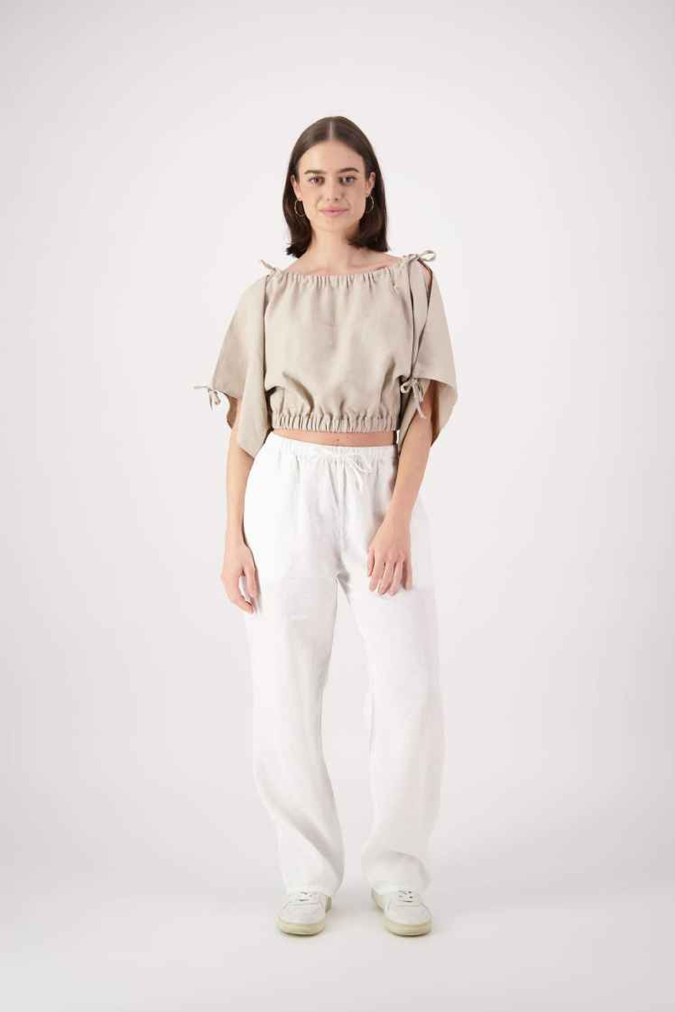 Main shot: "Naseby linen top in tan, relaxed cropped puff sleeve with gathered waist, handmade by Lohi Linen in Central Otago, New Zealand"