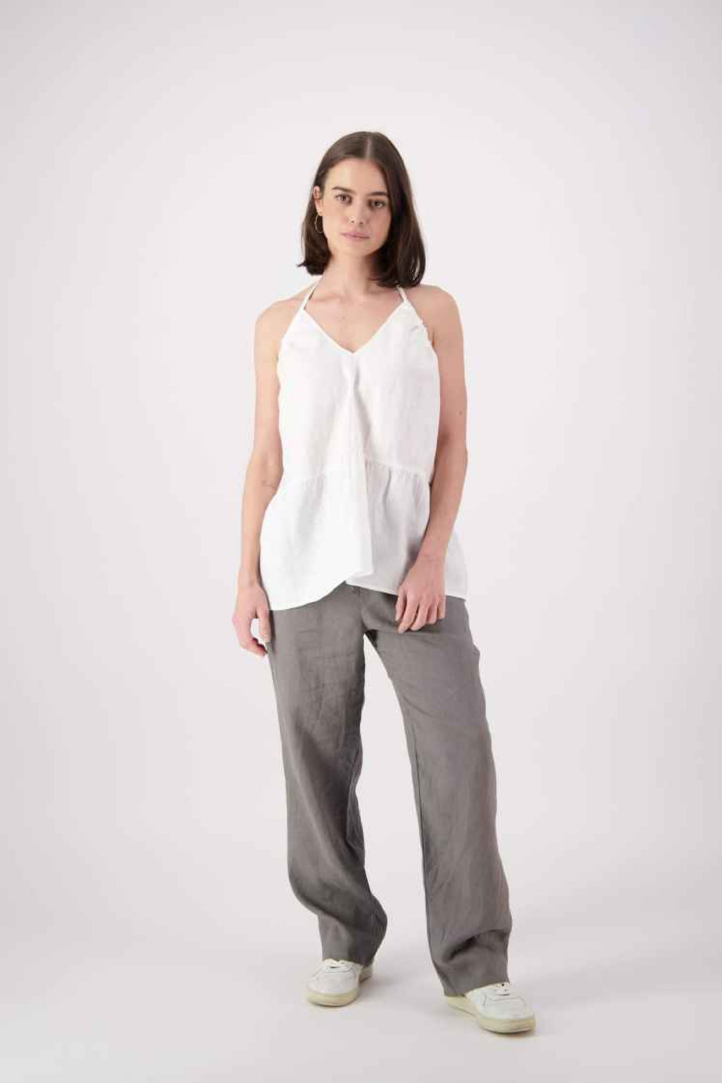 "Ranfurly linen top in natural showing versatile two-way wear — styled as off-shoulder or one-shoulder, handmade by Lohi Linen in Central Otago, New Zealand"