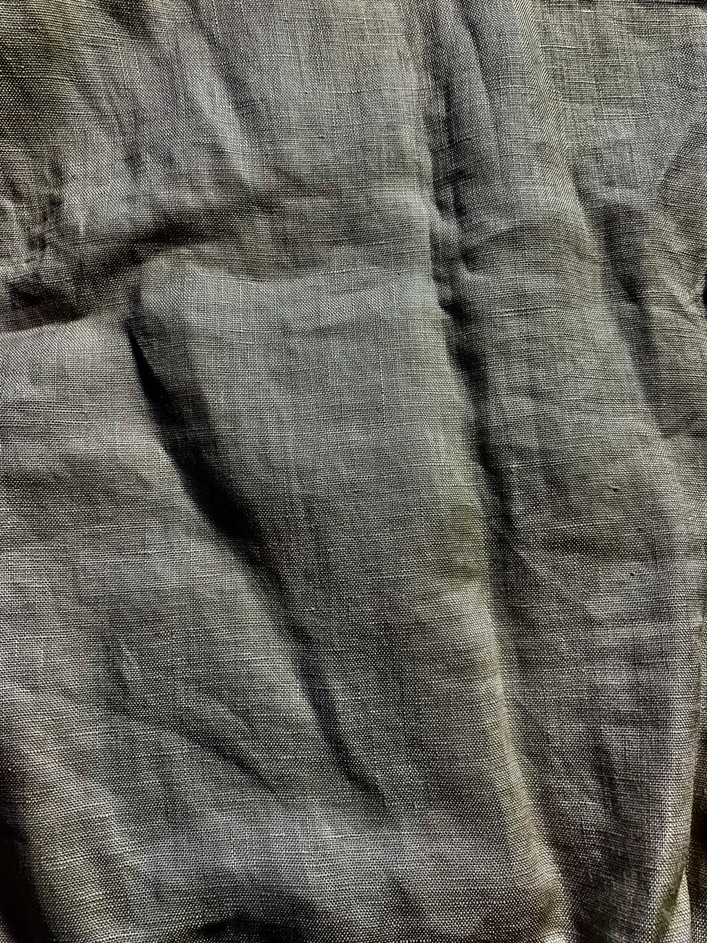 Olive texture swatch: "Olive green textured deadstock linen fabric swatch — Hawkdun top colourway, Lohi Linen Central Otago"