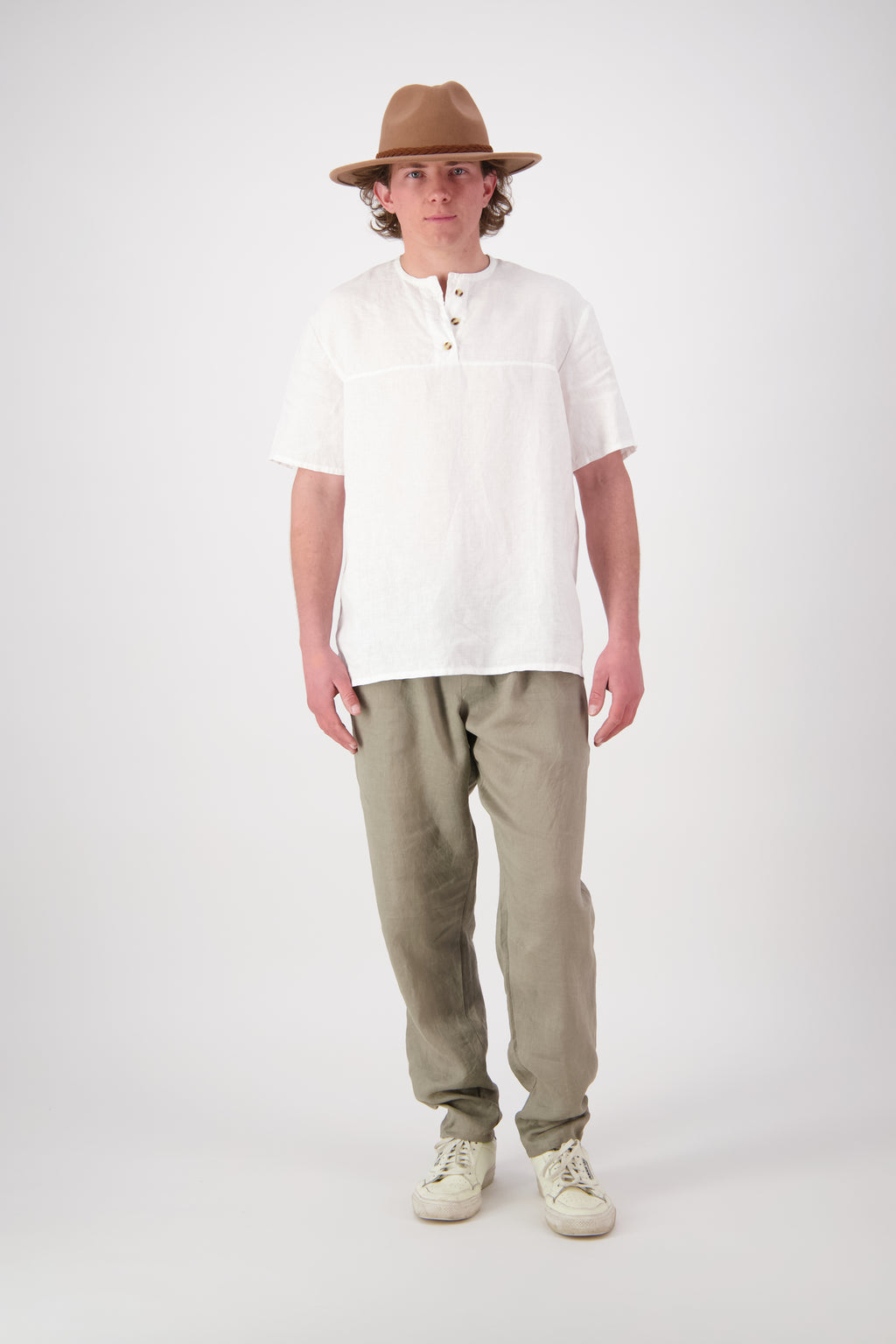Main shot (Oat) "Mt Buster linen pants mens in Oat, relaxed straight leg with drawstring waist, worn with white linen shirt, handmade by Lohi Linen in Central Otago, New Zealand"