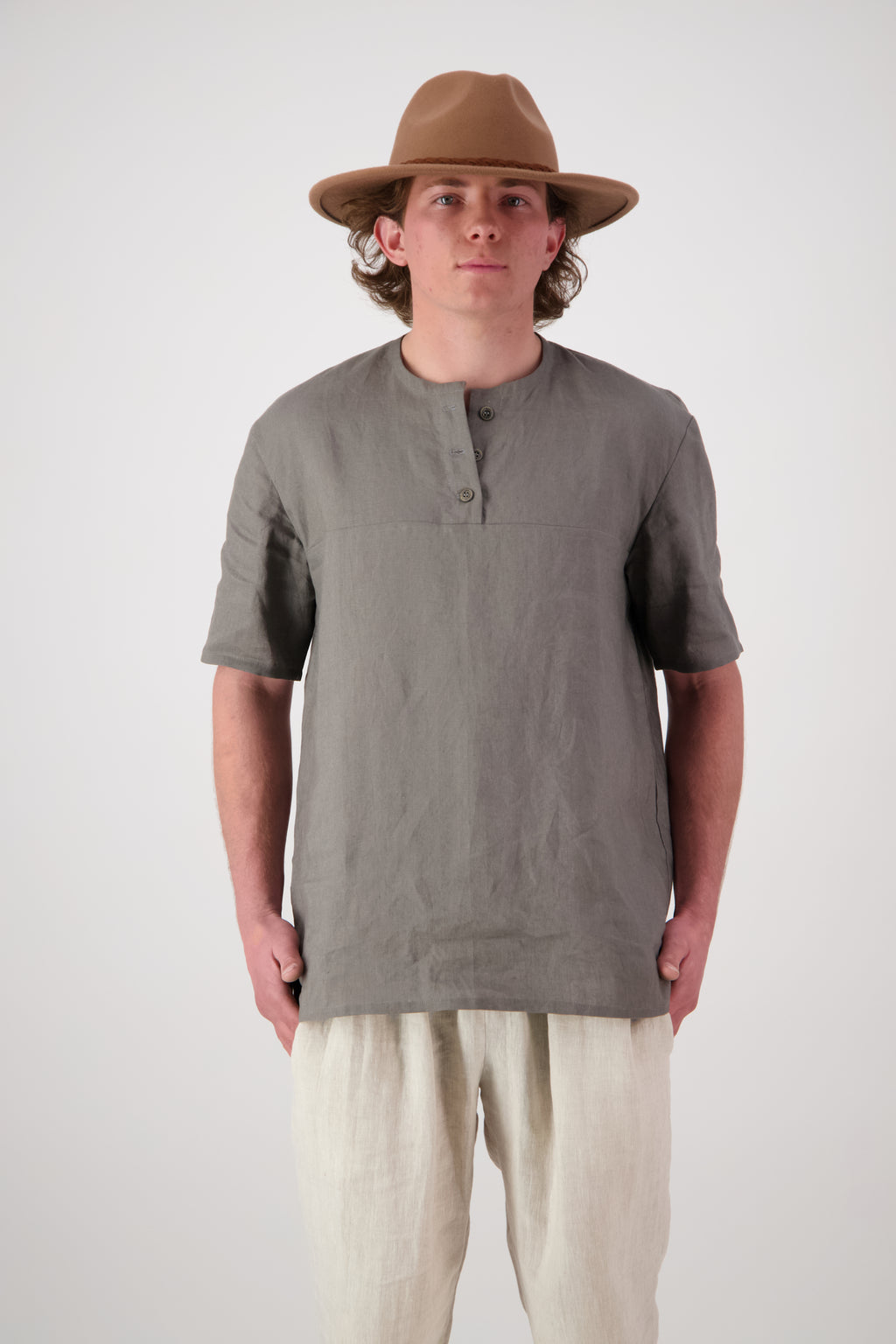 Main shot (grey/olive): "Hawkdun linen top in grey, relaxed henley style short sleeve with button neckline detail, handmade by Lohi Linen in Central Otago, New Zealand"