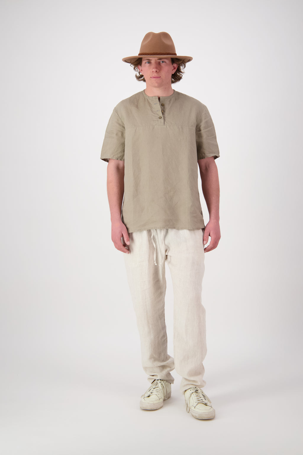 Front view khaki top: "Mt Buster linen pants mens in Natural worn with khaki linen top, relaxed fit, handmade by Lohi Linen in Ranfurly, New Zealand"