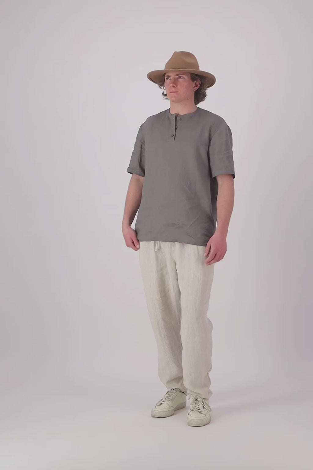 Video thumbnail (Natural): "Mt Buster linen pants mens in Natural styled with olive linen shirt relaxed fit, handmade by Lohi Linen in Ranfurly, Central Otago"