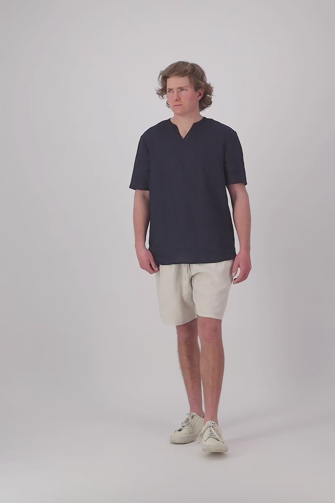 Video thumbnail: "St Bathans linen t-shirt in midnight navy styled with shorts, handmade by Lohi Linen in Ranfurly, Central Otago"