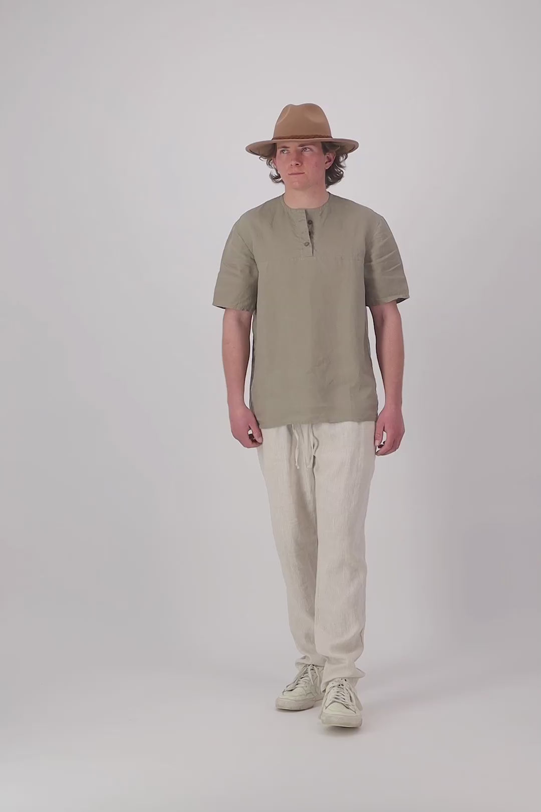 Video thumbnail: "Hawkdun linen top in grey video, relaxed henley short sleeve, handmade by Lohi Linen in Ranfurly, New Zealand"