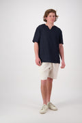 Front view stone: "St Bathans linen t-shirt in Midnight, relaxed short sleeve notch neckline, handmade by Lohi Linen in Central Otago, New Zealand"