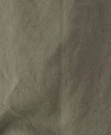 Green fabric swatch: "Olive green deadstock linen fabric swatch — Rough Ridge singlet colourway, Lohi Linen Central Otago"